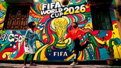 Kabar Terbaru: Keseruan Nobar Final FIFA ASEAN Cup 2026 di IQOS Boutique SCBD: Suporter Tegang hingga Ray... 9 Mural berwarna-warni Piala Dunia FIFA 2026 dengan anak-anak bermain sepak bola di latar depan.